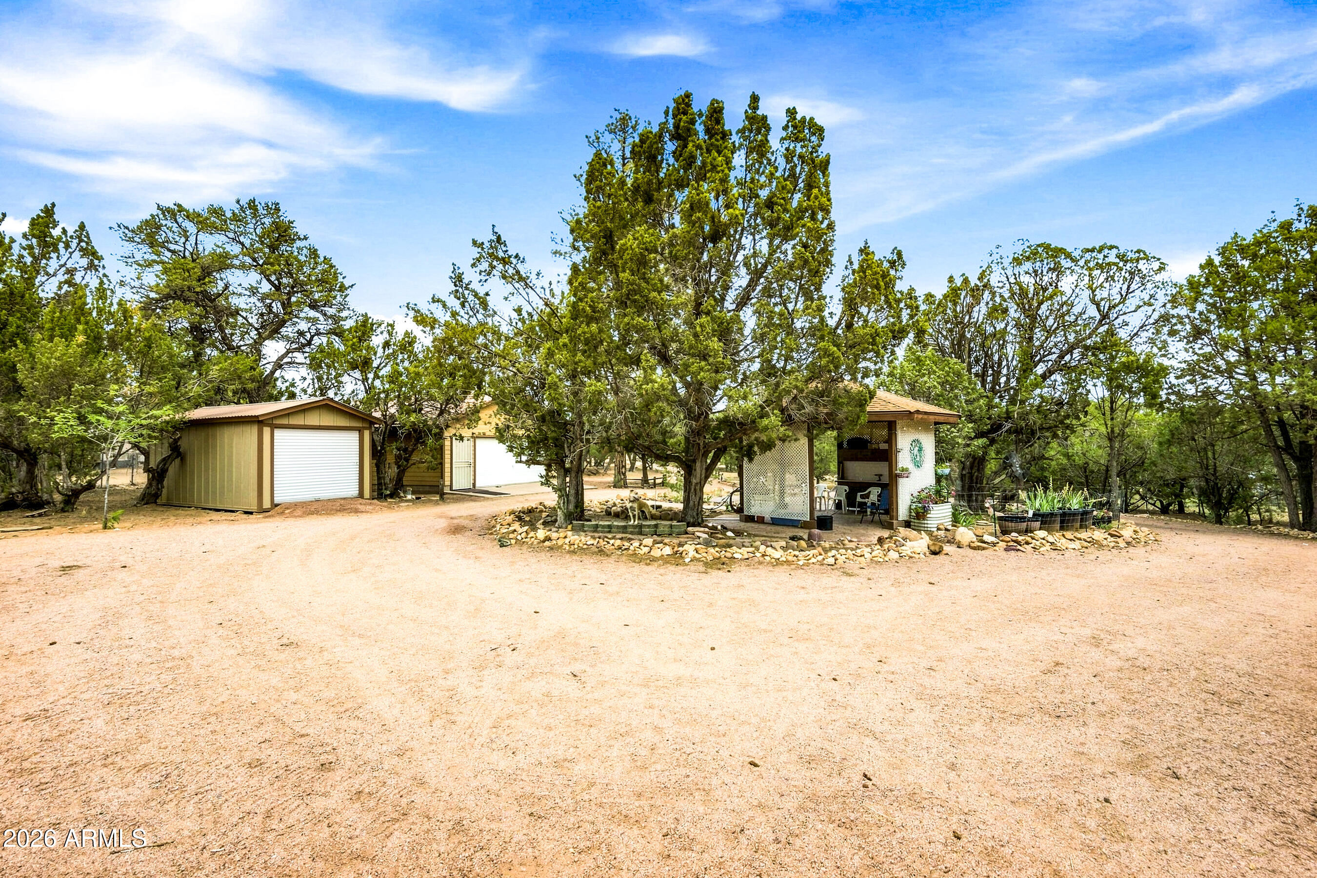 3071 Ponderosa Road Overgaard, AZ 85933 - Photo 7 of 72 Circular drive with gazebo in the middle