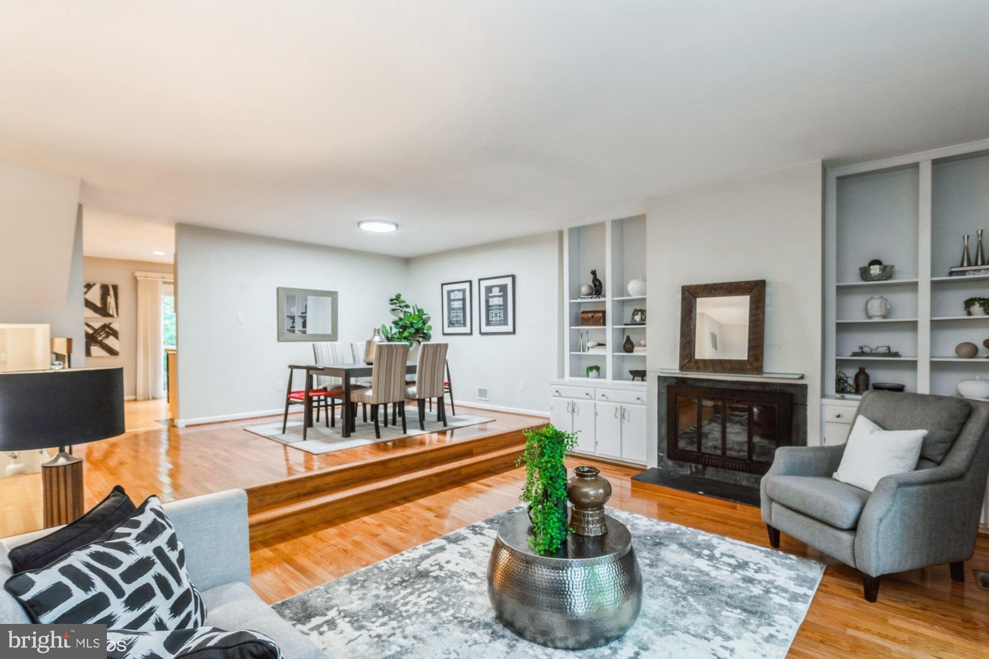 12015 Insha Court Reston, VA 20191 - Photo 14 of 39 DINING ROOM OVERLOOKING LIVING AREA with BOOKCASE