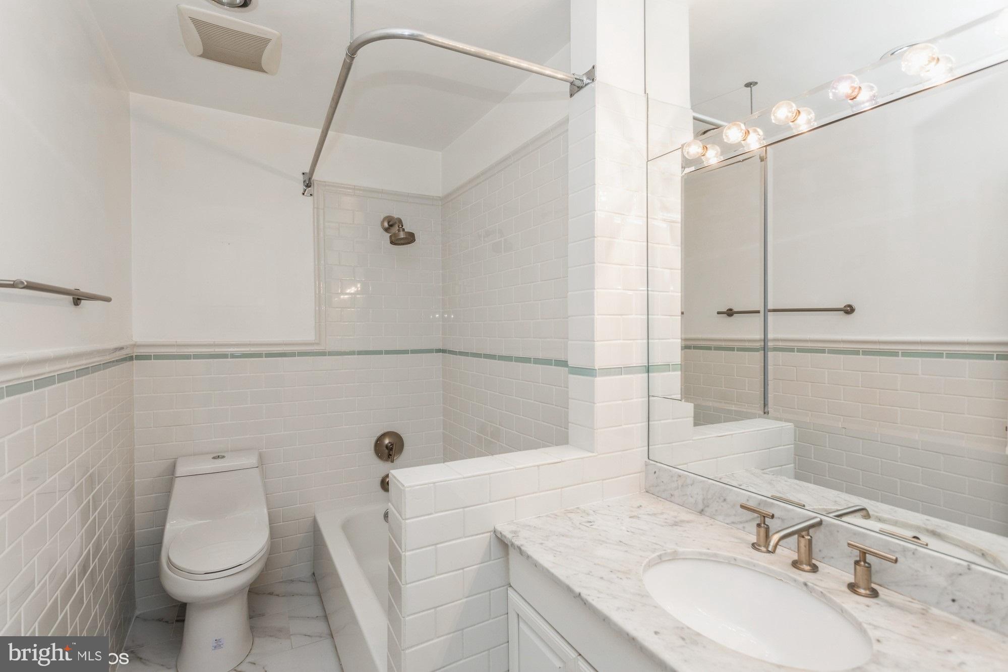12015 Insha Court Reston, VA 20191 - Photo 30 of 39 REMODELED HALL BATH
