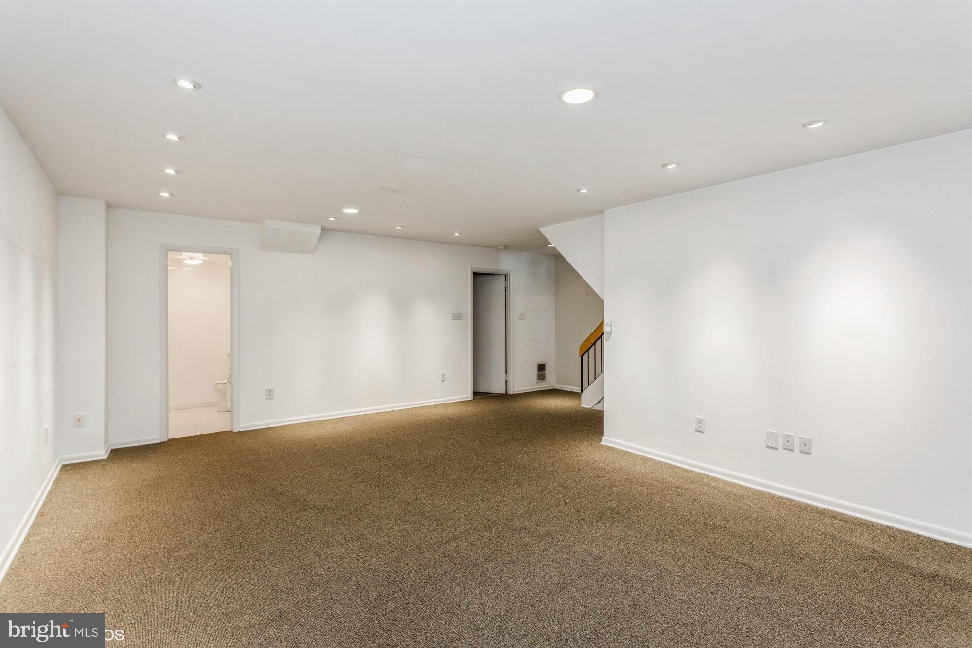 12015 Insha Court Reston, VA 20191 - Photo 32 of 39 LOTS OF ROOM FOR FUN IN LOWER LEVEL