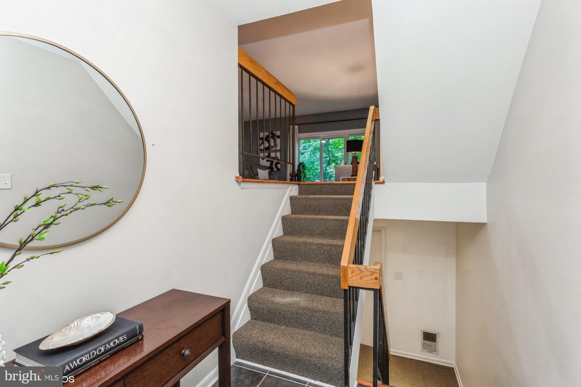 12015 Insha Court Reston, VA 20191 - Photo 7 of 39 Staircase up to main level