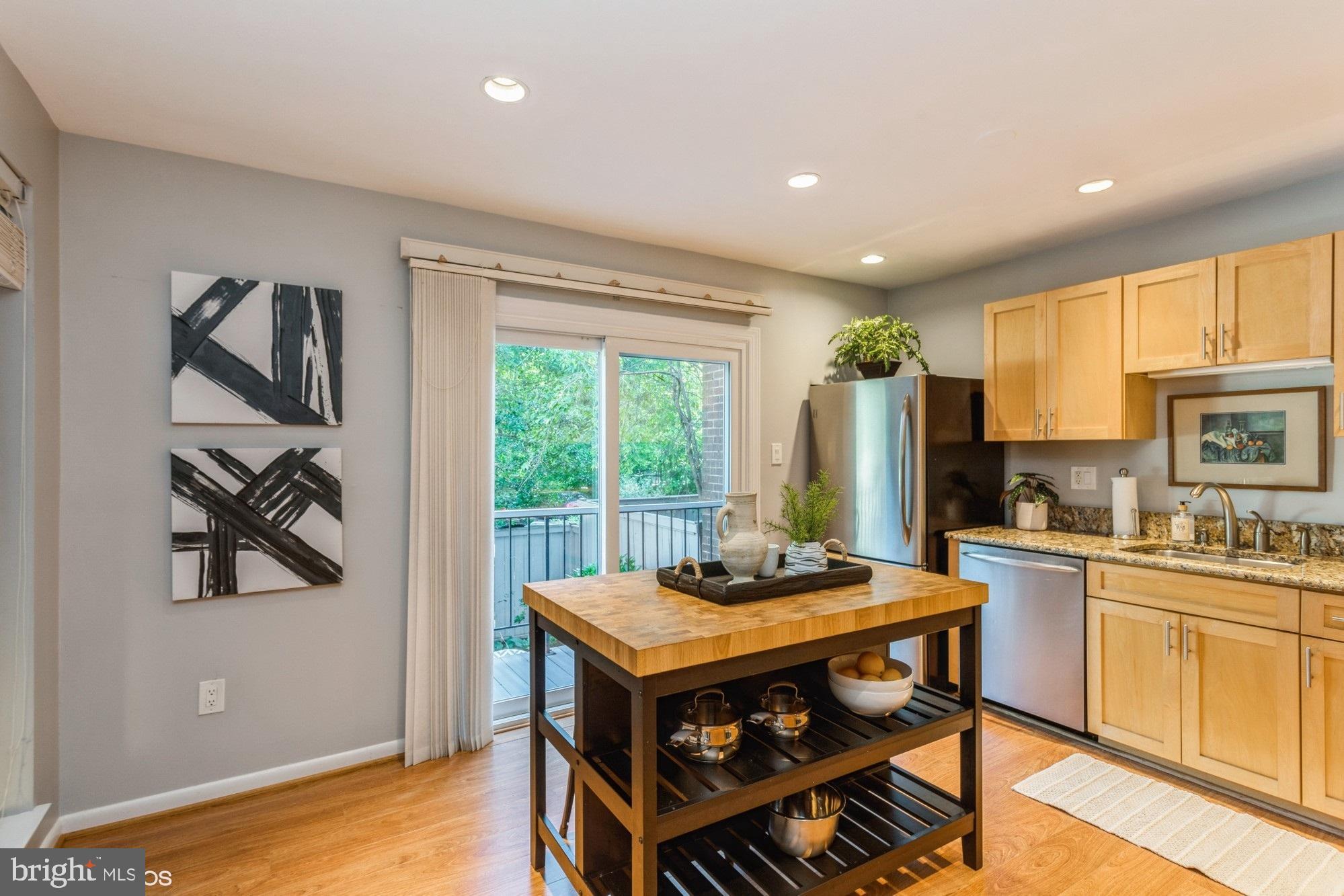 12015 Insha Court Reston, VA 20191 - Photo 9 of 39 UPDATED KITCHEN with sliding glass door to deck
