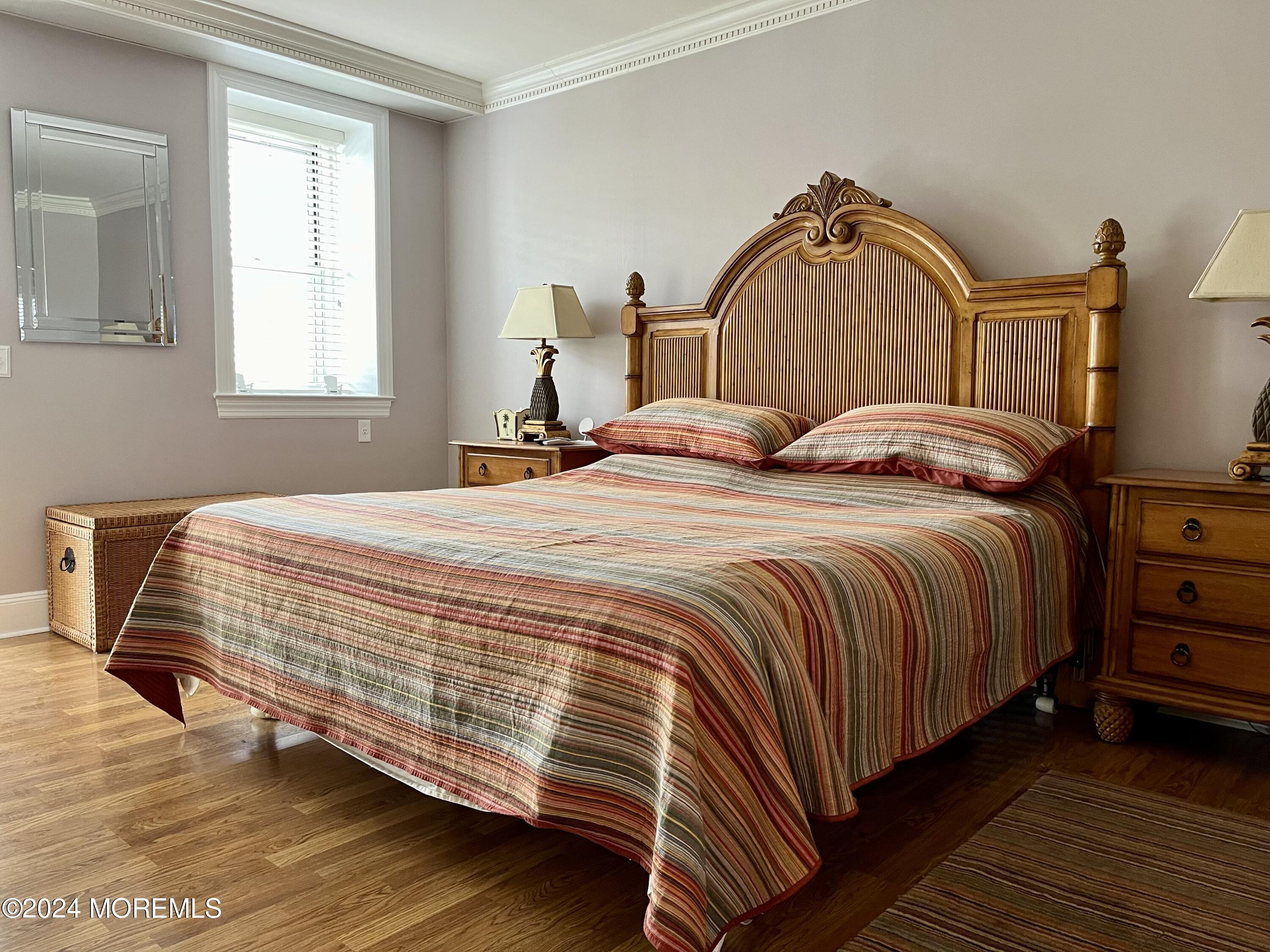 700 Ocean Avenue, Unit G38 Spring Lake, NJ 07762 - Photo 3 of 37 a bedroom with a bed and window