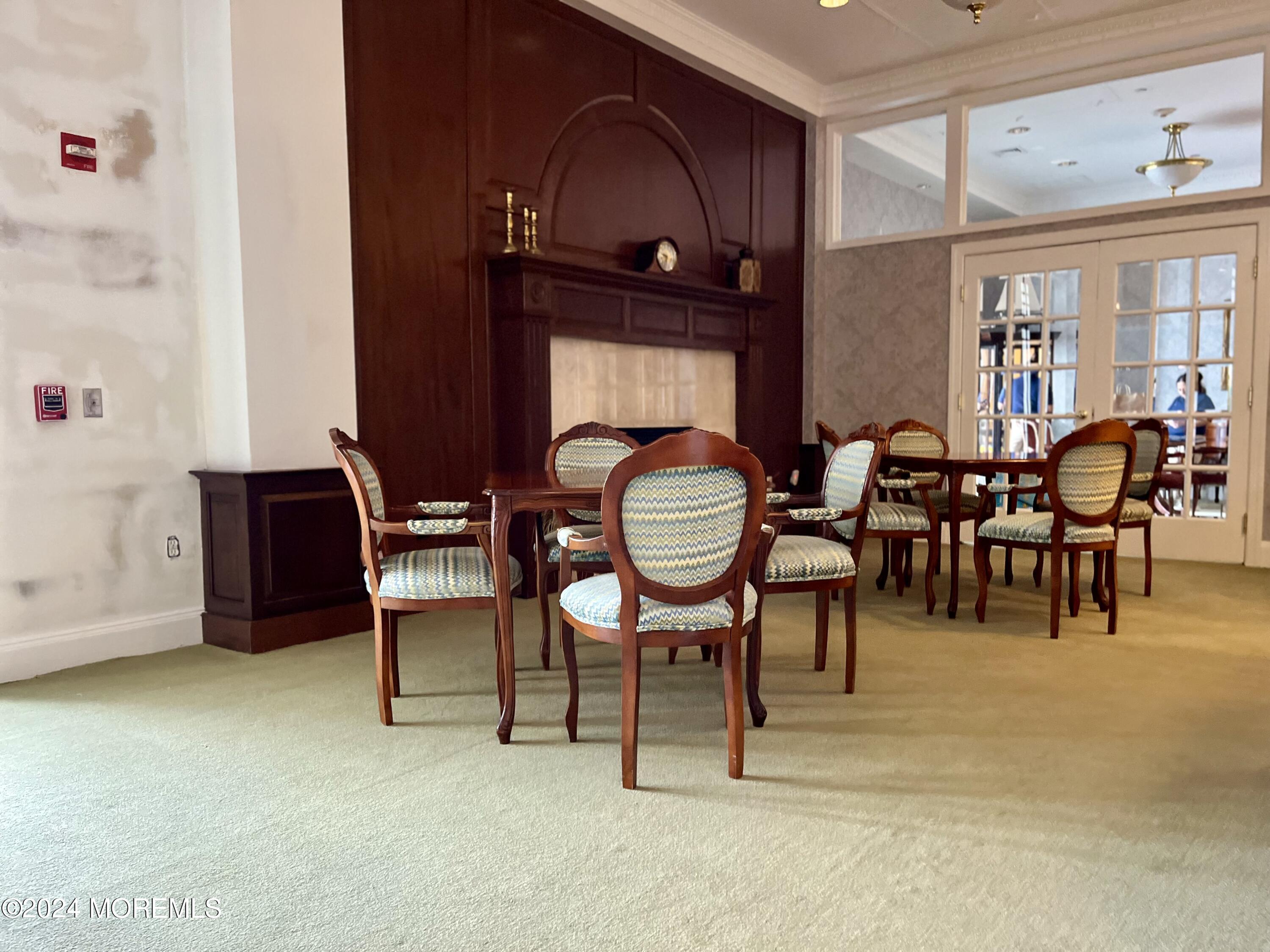 700 Ocean Avenue, Unit G38 Spring Lake, NJ 07762 - Photo 5 of 37 a view of a livingroom with furniture and windows