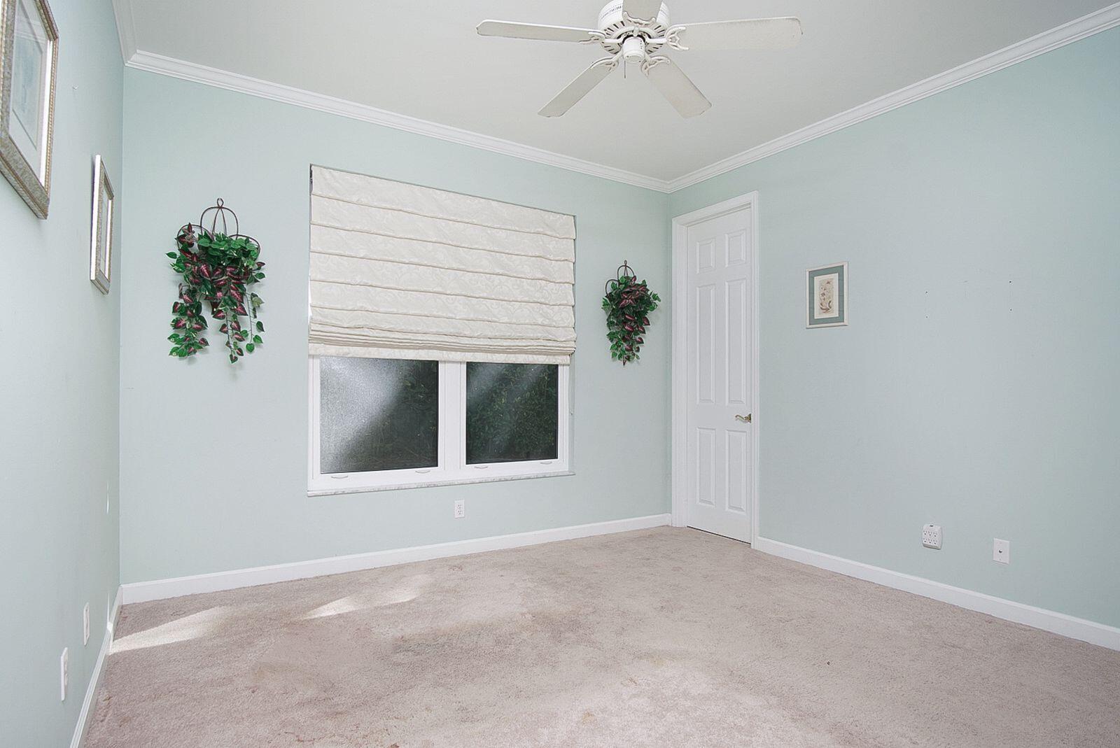 5496 Southeast Reef Way Stuart, FL 34997 - Photo 12 of 35 a view of an empty room with a window