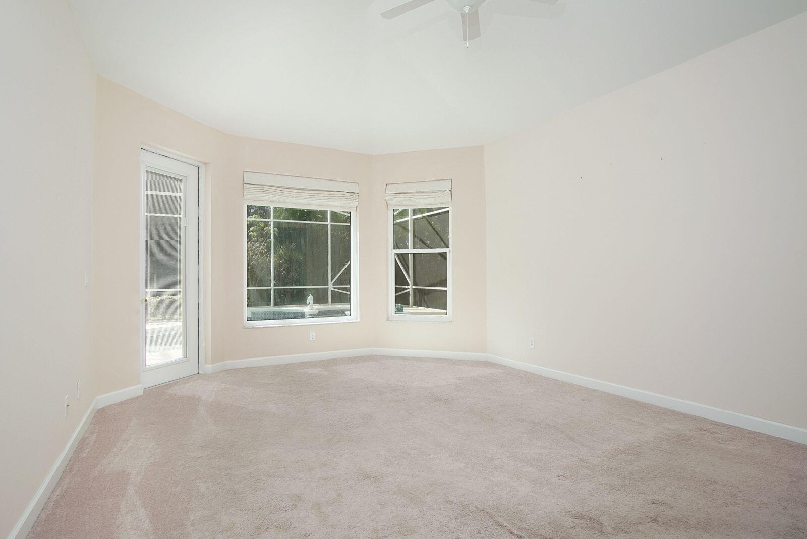 5496 Southeast Reef Way Stuart, FL 34997 - Photo 25 of 35 a view of an empty room with a window