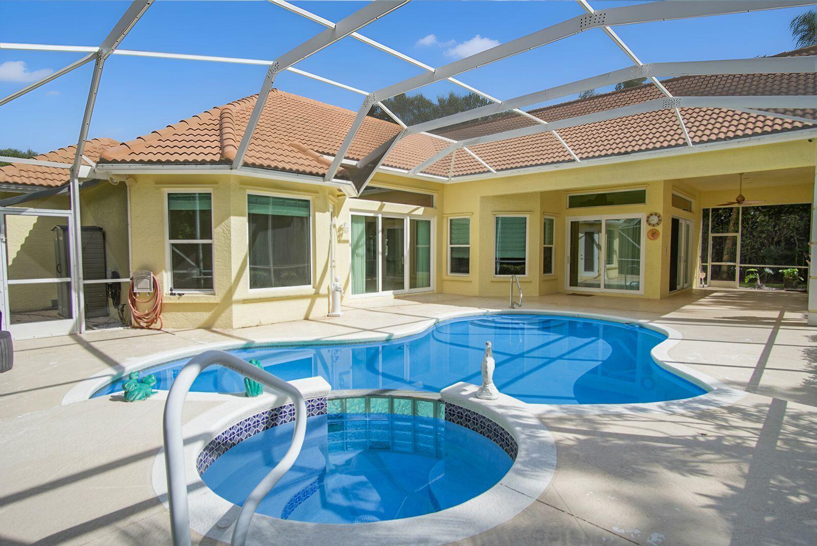 5496 Southeast Reef Way Stuart, FL 34997 - Photo 3 of 35 a view of a house with swimming pool and furniture