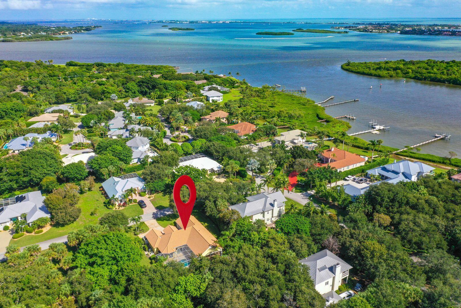 5496 Southeast Reef Way Stuart, FL 34997 - Photo 34 of 35 a view of a lake with a houses