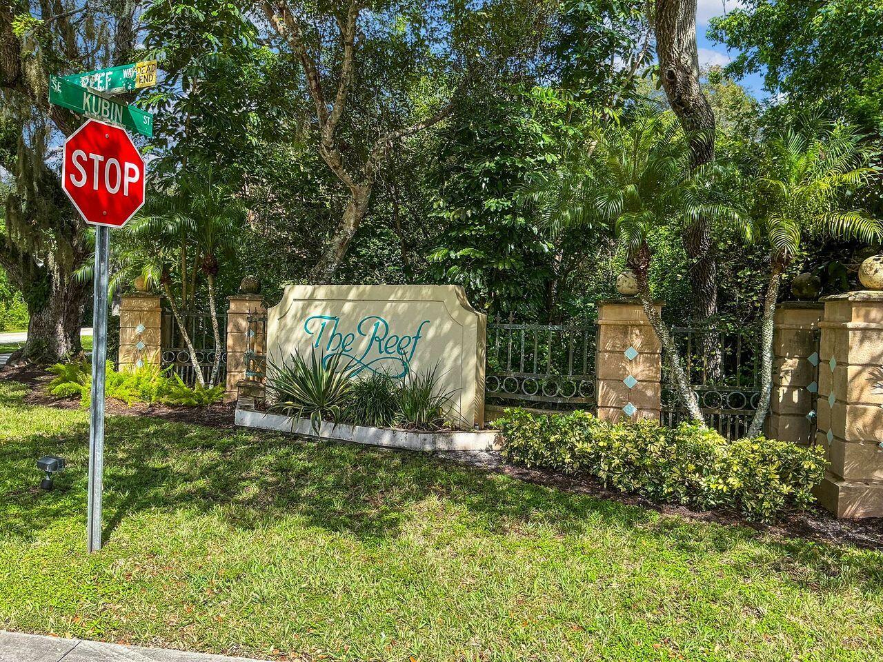 5496 Southeast Reef Way Stuart, FL 34997 - Photo 35 of 35 a view of outdoor space with sign board
