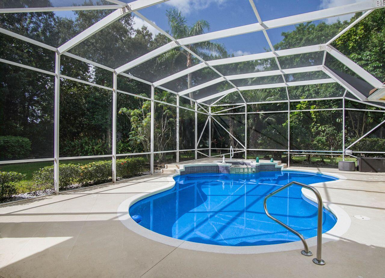 5496 Southeast Reef Way Stuart, FL 34997 - Photo 6 of 35 a view of a house with a swimming pool