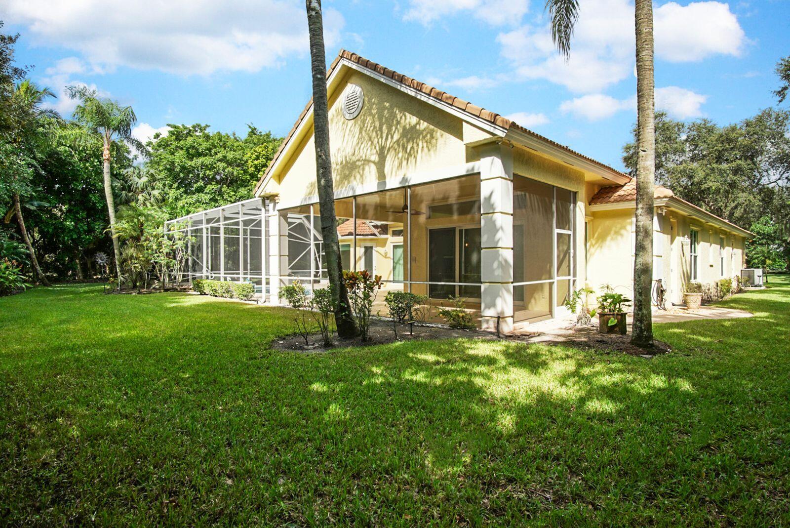 5496 Southeast Reef Way Stuart, FL 34997 - Photo 7 of 35 a view of a house with a yard and sitting area