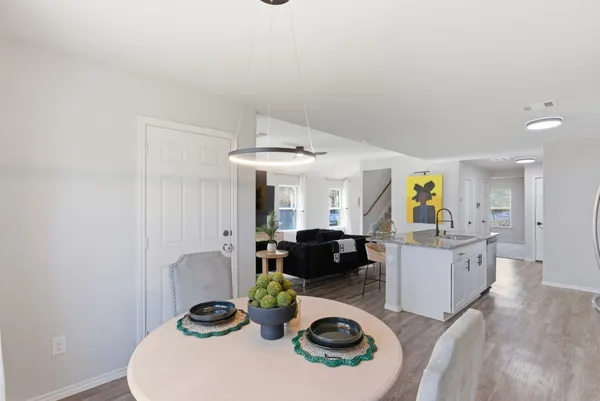 a living room with furniture and a table