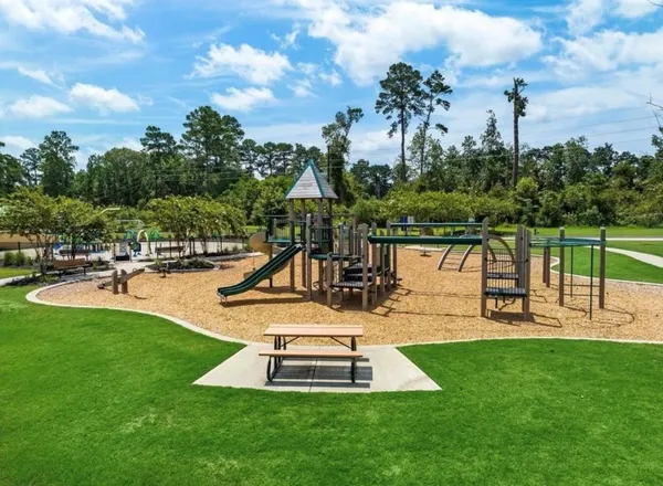 a view of a park with slide