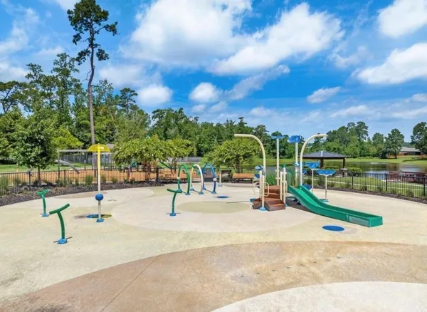 a view of a swimming pool with a sitting space