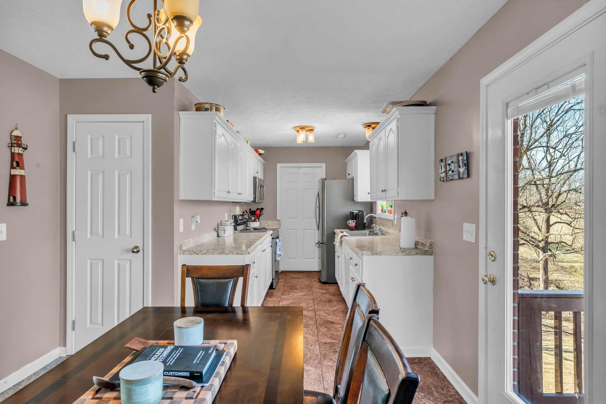 2450 Scotty Parker Road Portland, TN 37148 - Photo 12 of 37 a view of a livingroom with furniture hardwood floor and a living room