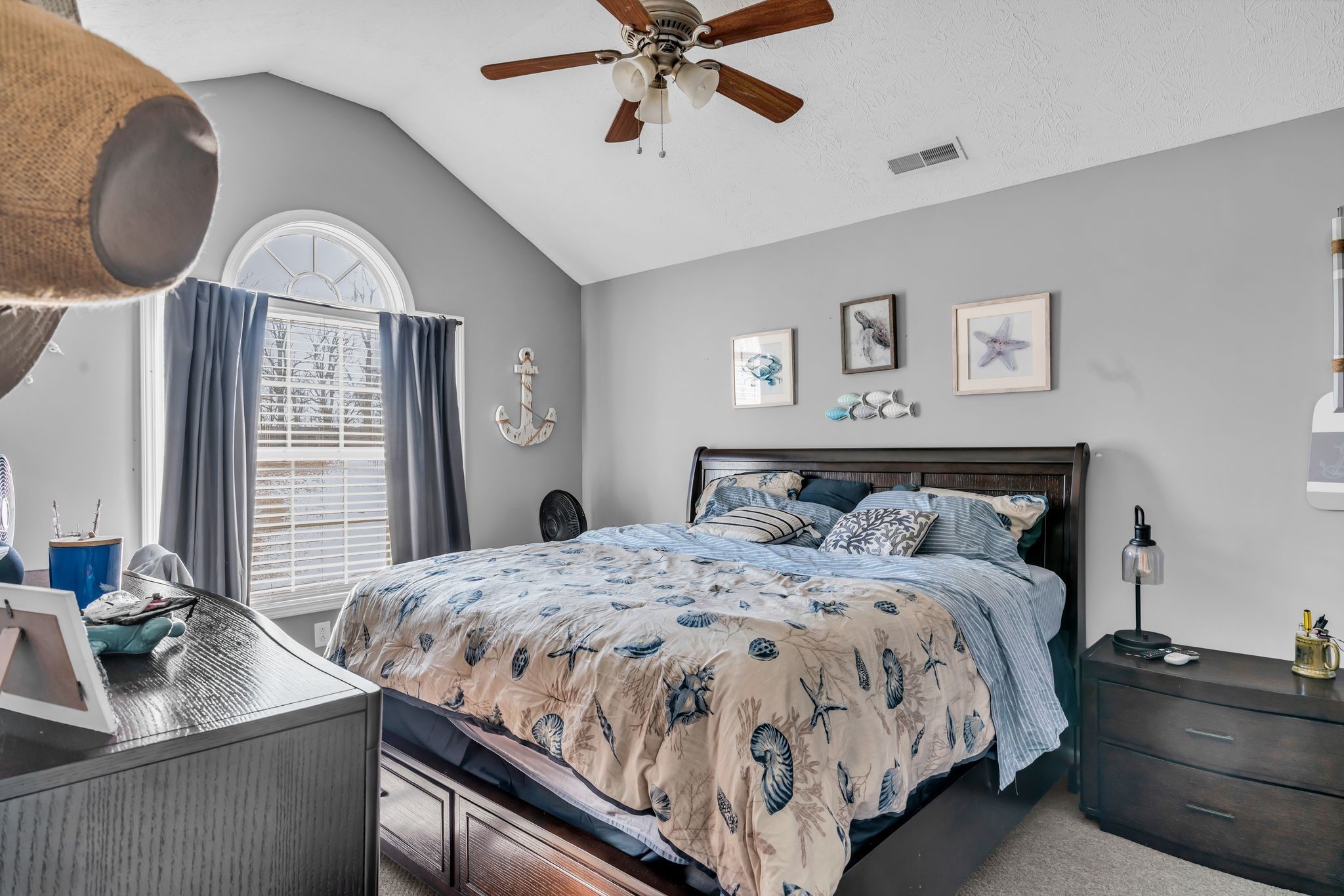 2450 Scotty Parker Road Portland, TN 37148 - Photo 16 of 37 a bedroom with a bed mirror and window