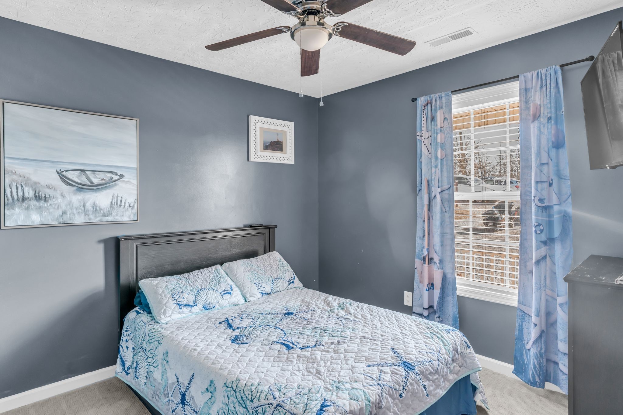 2450 Scotty Parker Road Portland, TN 37148 - Photo 19 of 37 a bedroom with a bed and window