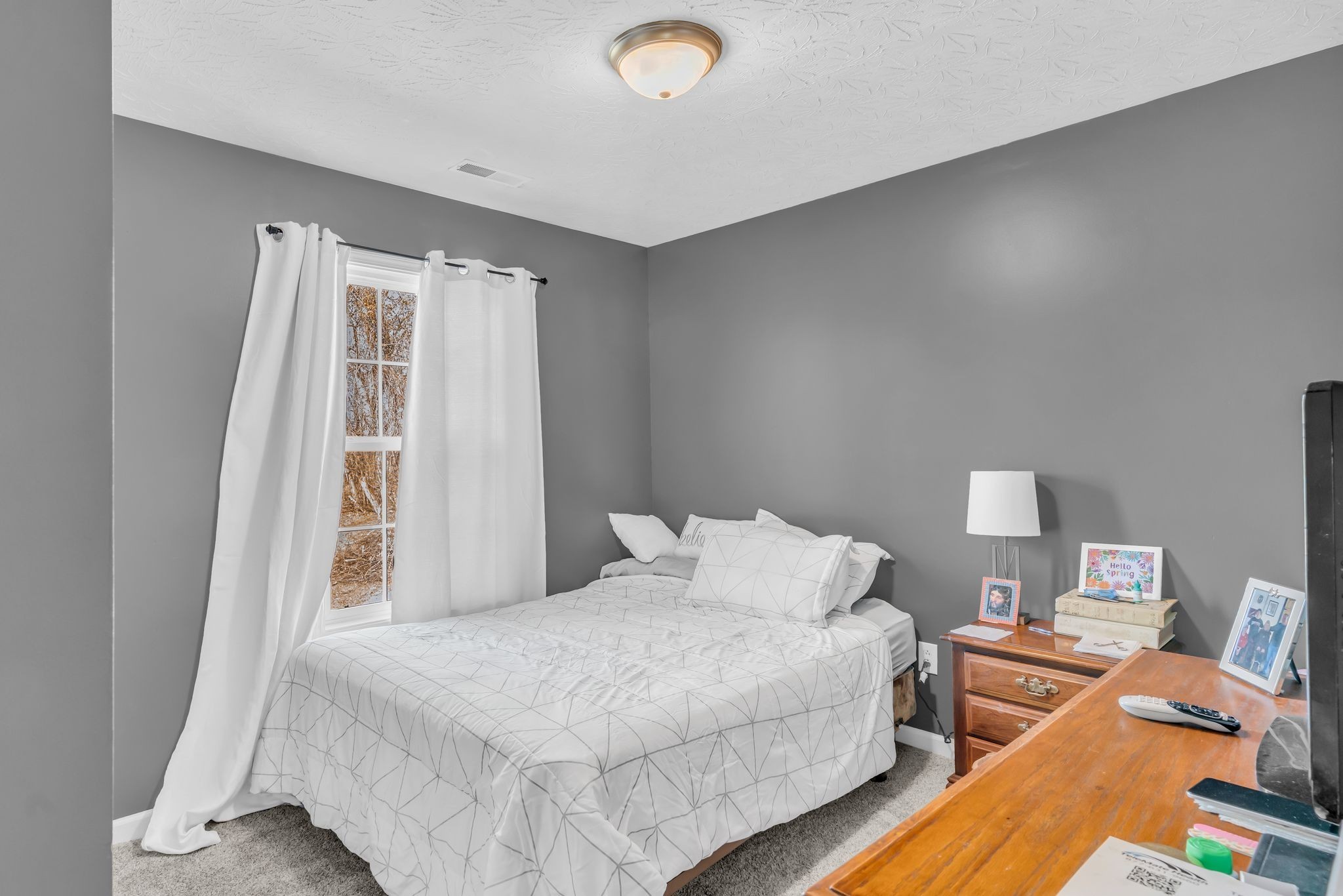 2450 Scotty Parker Road Portland, TN 37148 - Photo 21 of 37 a bedroom with a bed and a window