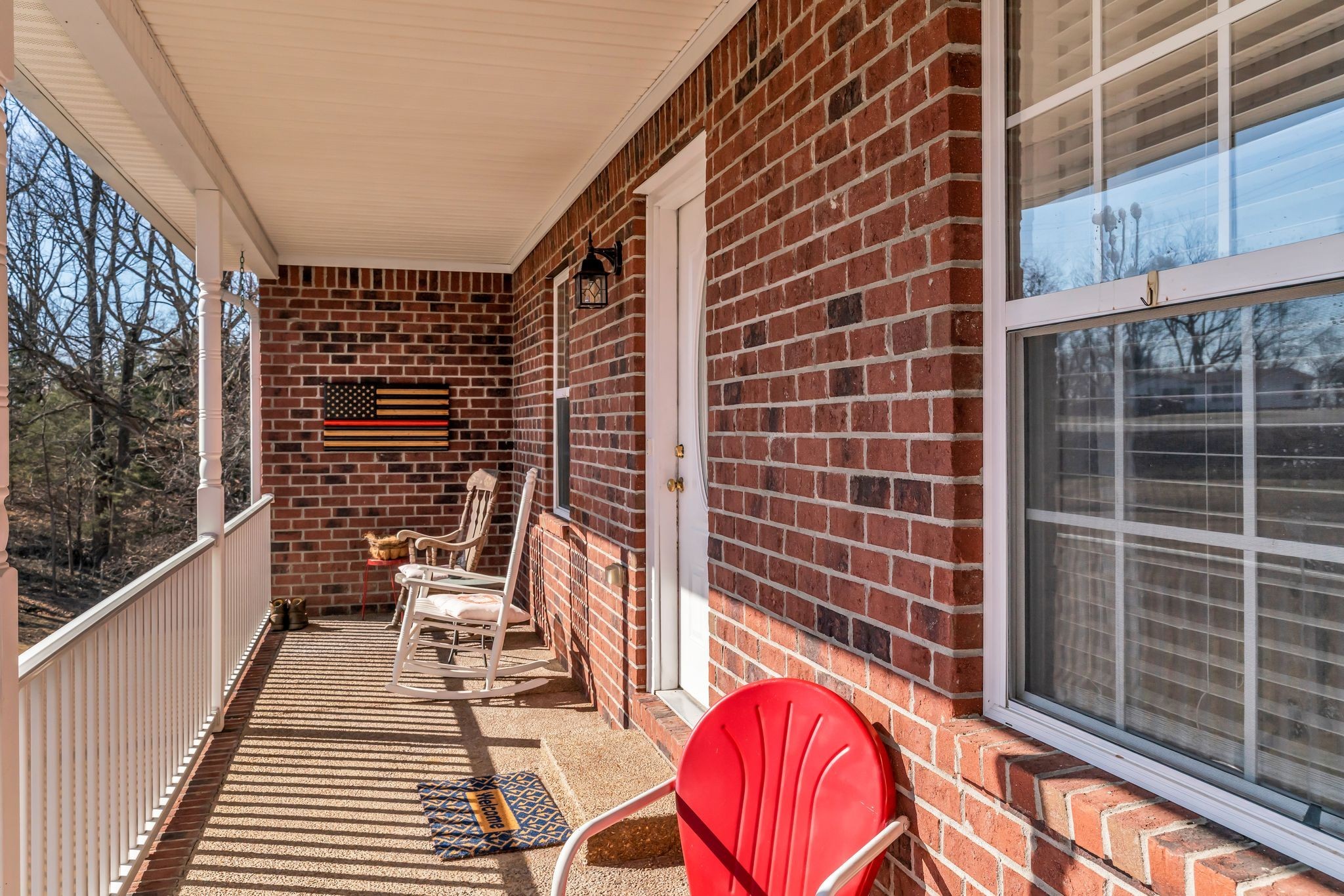 2450 Scotty Parker Road Portland, TN 37148 - Photo 4 of 37 a view of balcony with wooden floor and windows