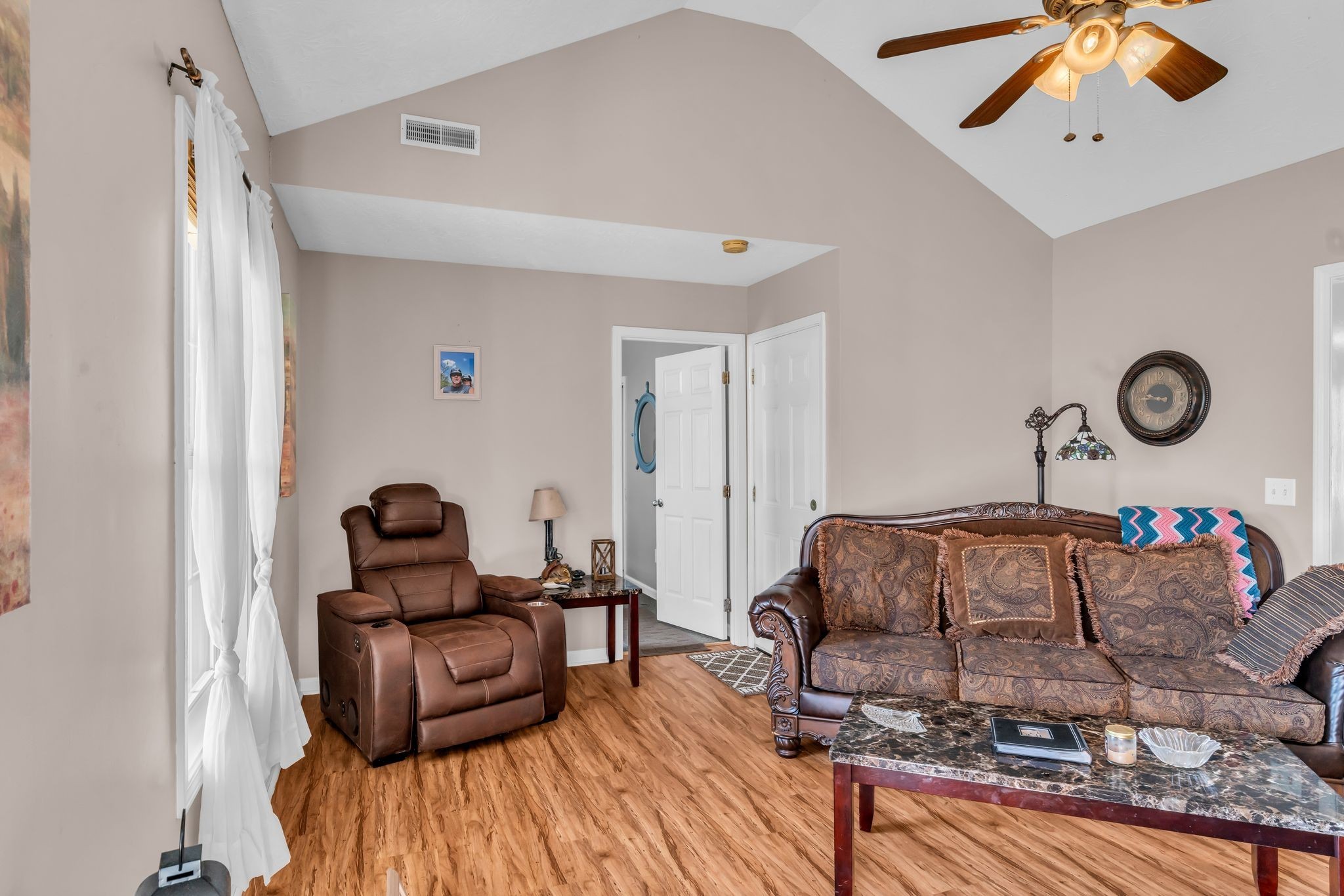 2450 Scotty Parker Road Portland, TN 37148 - Photo 6 of 37 a living room with furniture and a wooden floor