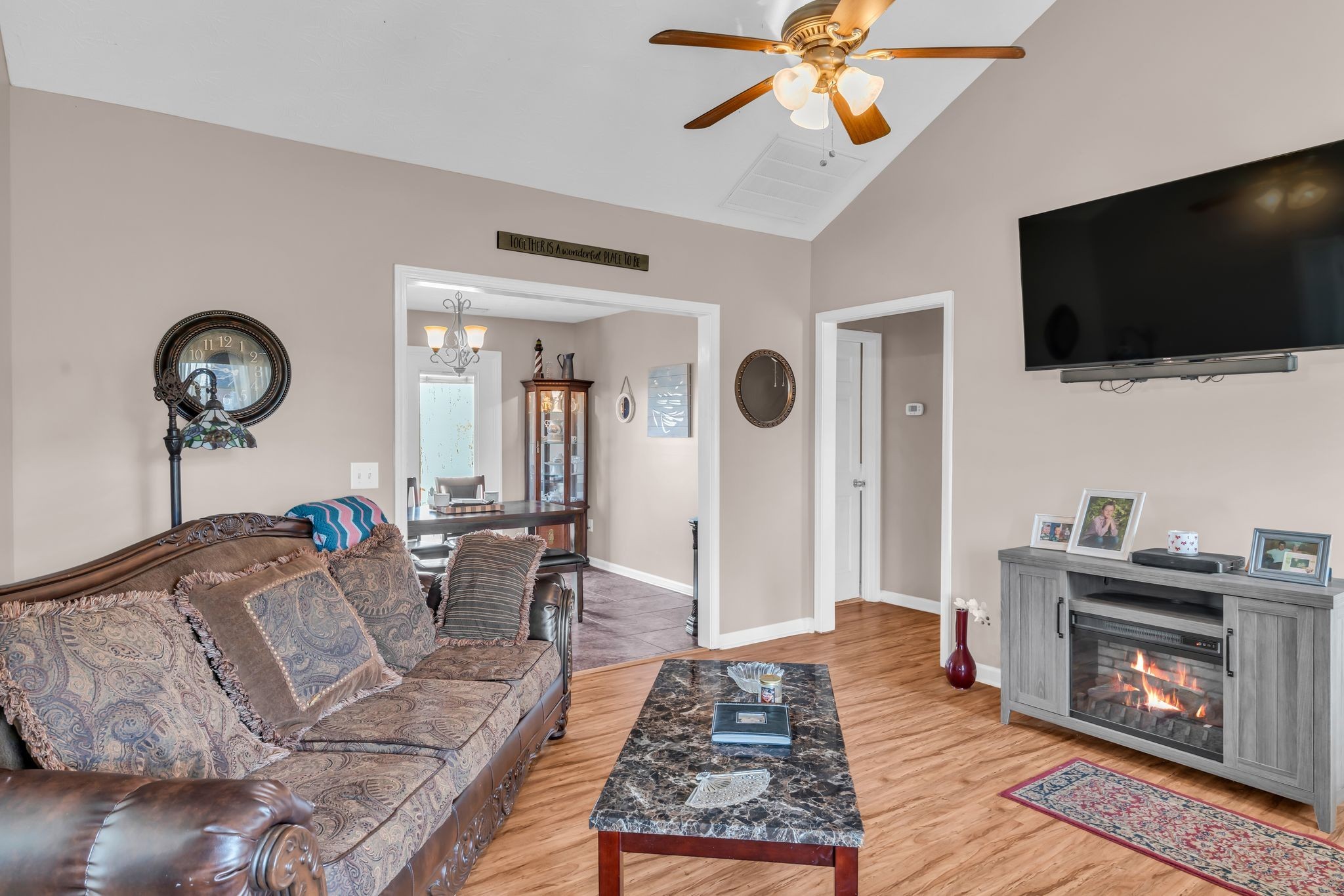 2450 Scotty Parker Road Portland, TN 37148 - Photo 8 of 37 a living room with furniture and a flat screen tv