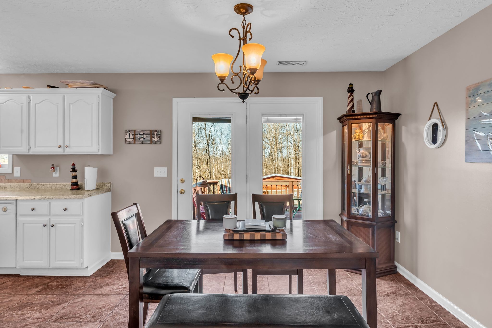 2450 Scotty Parker Road Portland, TN 37148 - Photo 10 of 37 a view of a dining room with furniture window and wooden floor