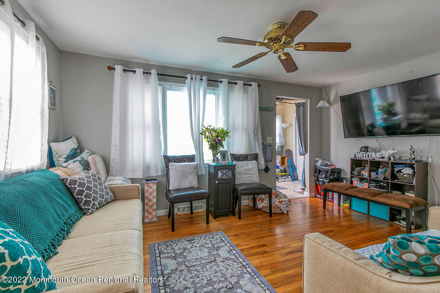 2314 Oak Tree Road Point Pleasant, NJ 08742 - Photo 13 of 17 a living room with furniture and a flat screen tv