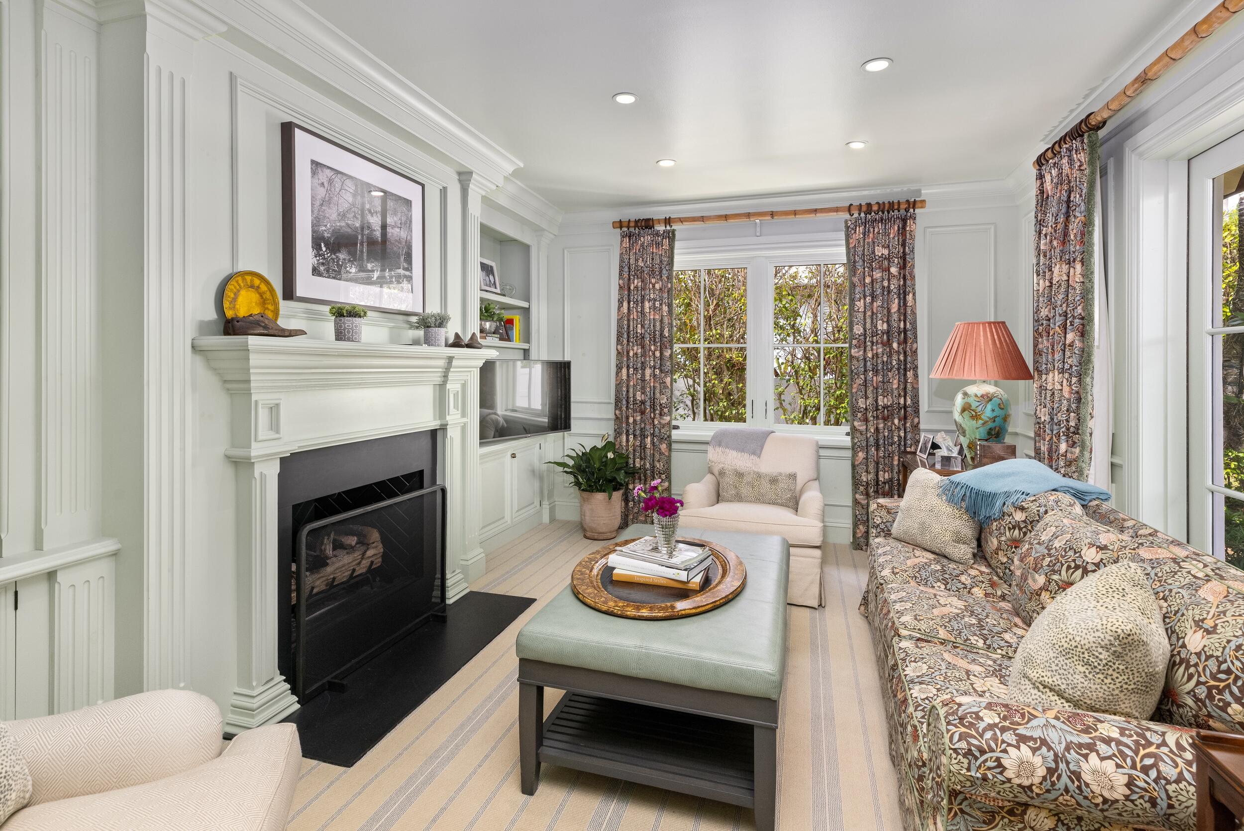 258 List Road Palm Beach, FL 33480 - Photo 23 of 49 a living room with furniture and a fireplace