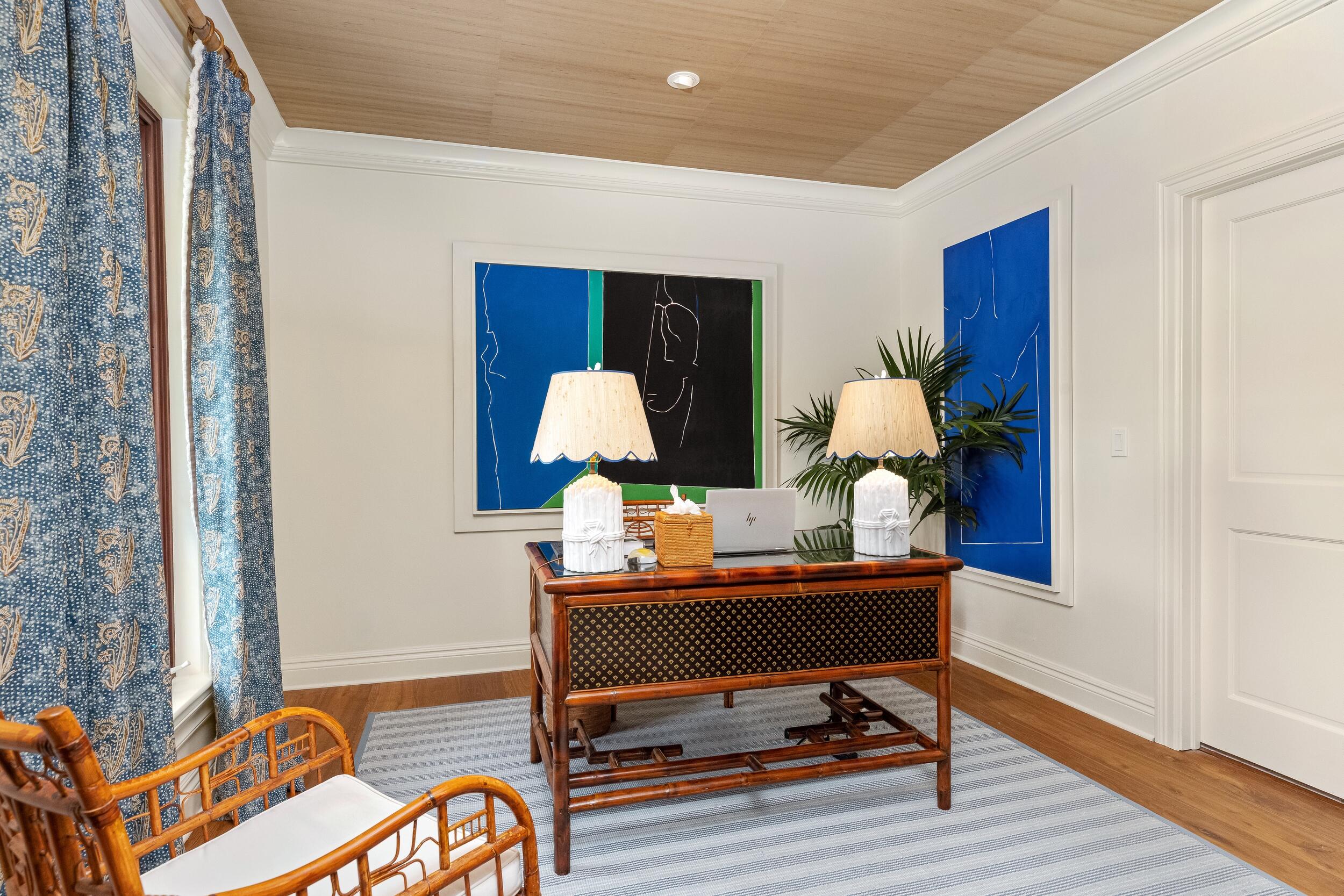 258 List Road Palm Beach, FL 33480 - Photo 25 of 49 a room with chandelier fan and wooden floor