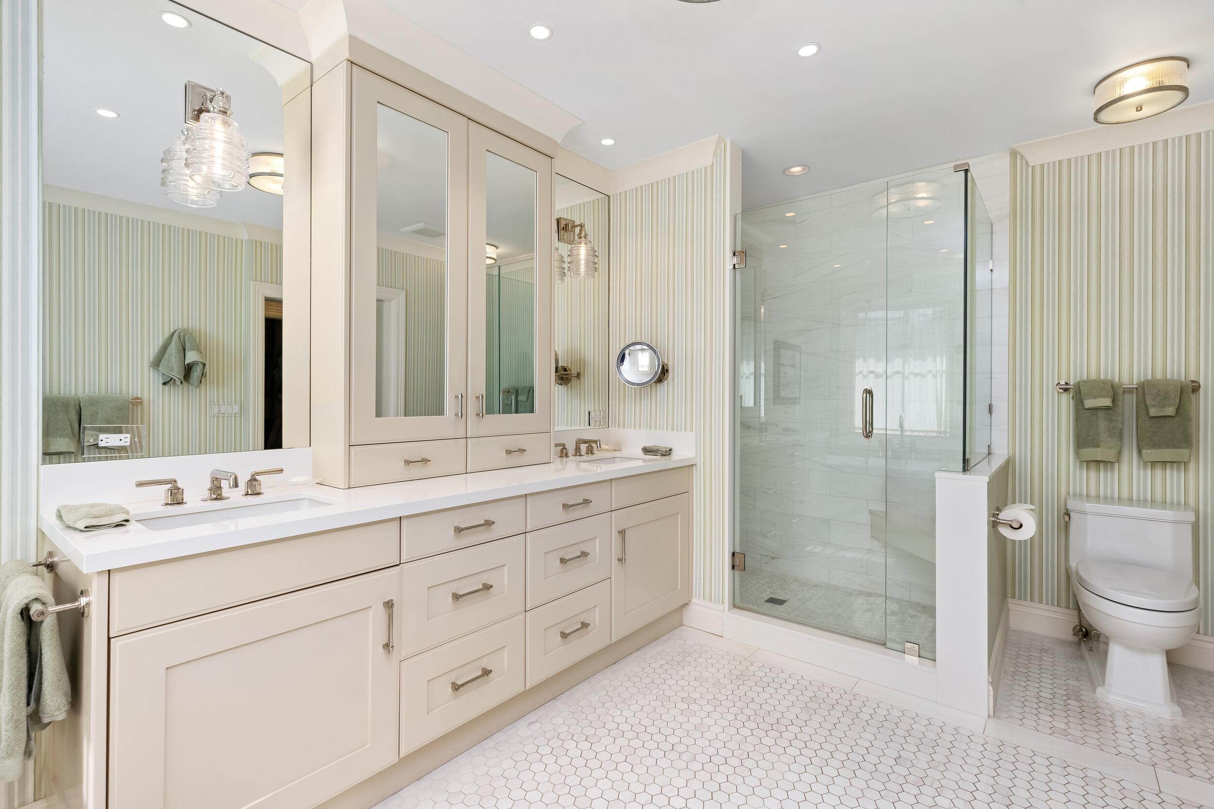 258 List Road Palm Beach, FL 33480 - Photo 31 of 49 a spacious bathroom with a shower sink mirror and toilet