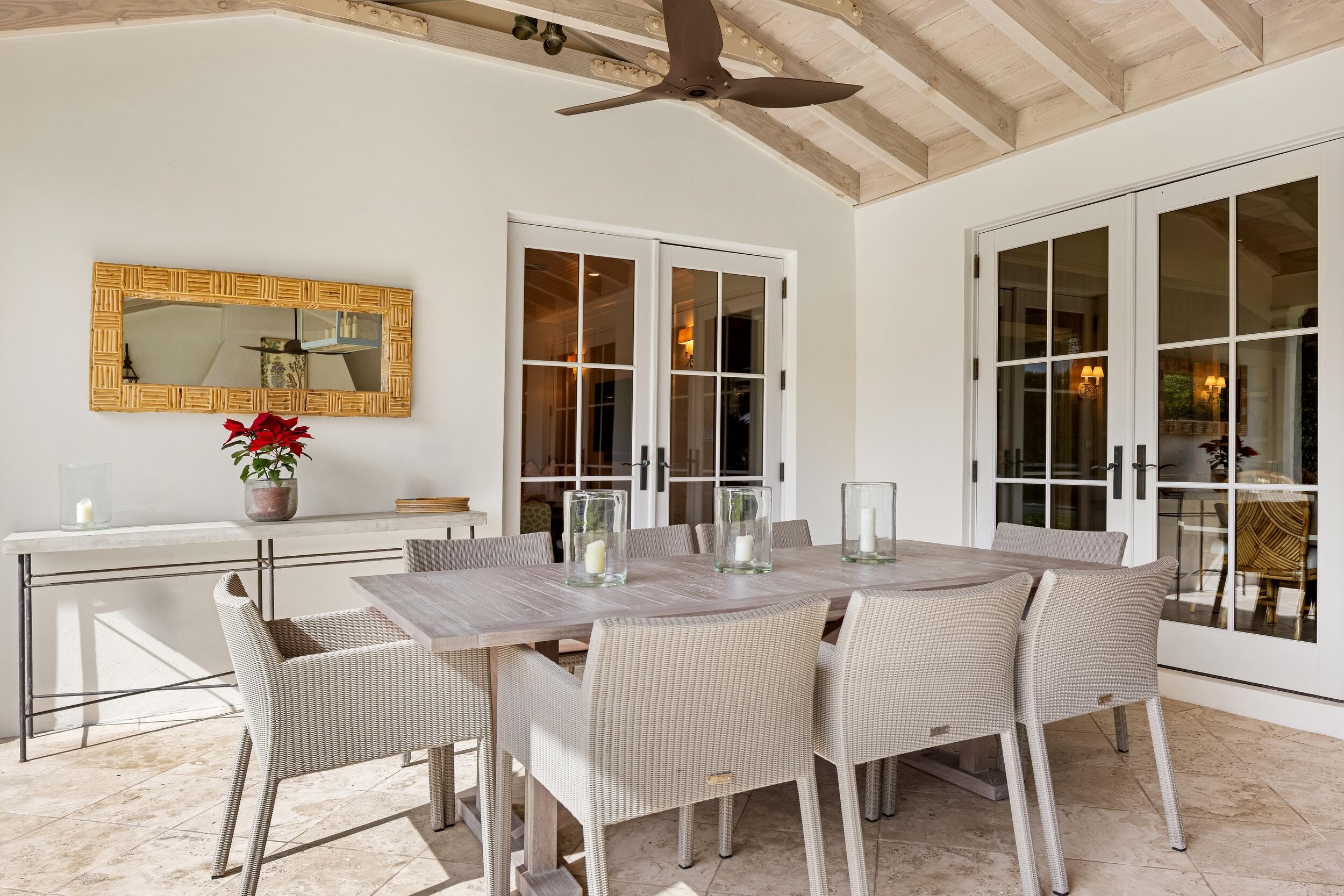 258 List Road Palm Beach, FL 33480 - Photo 37 of 49 a view of a dining room with furniture and window