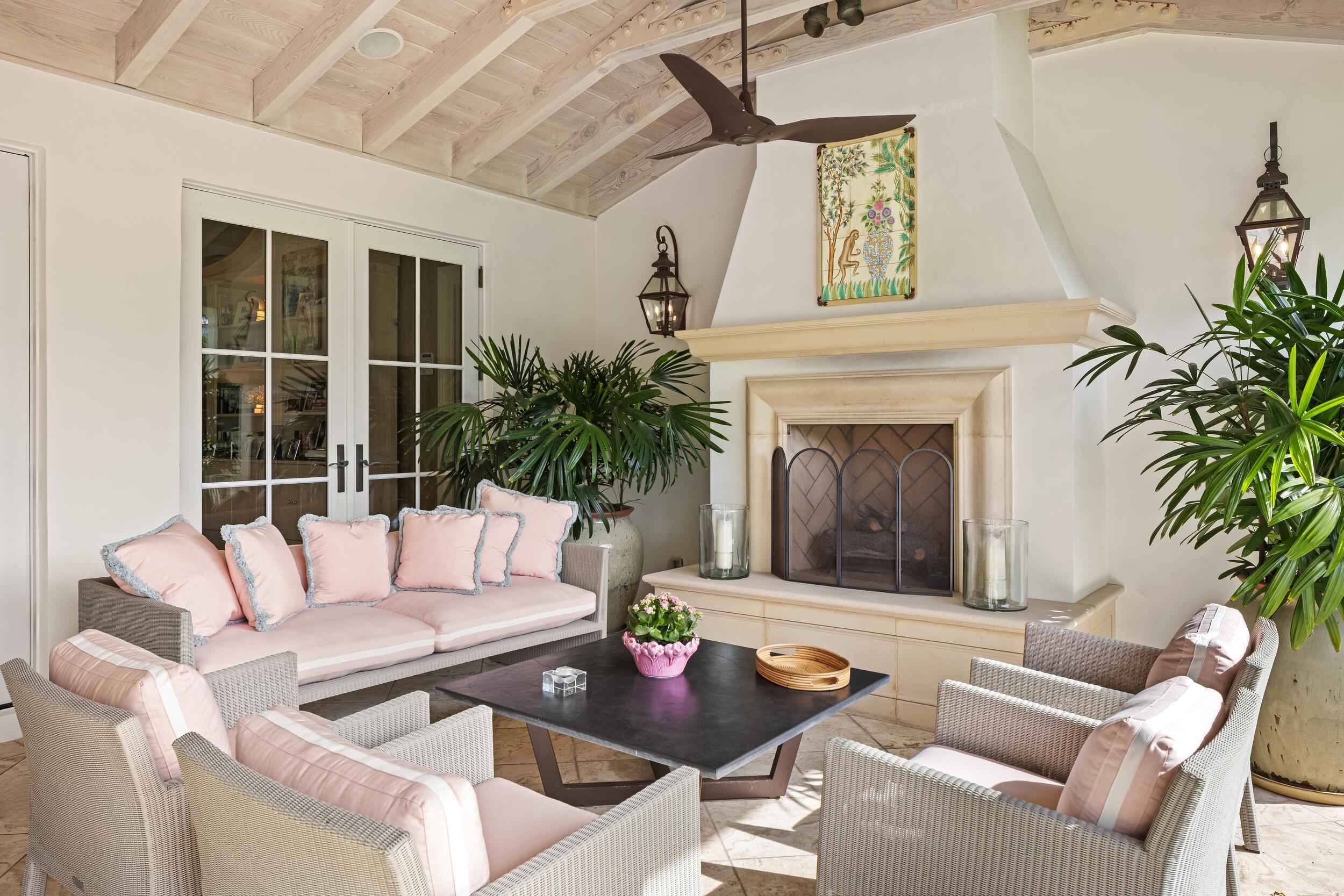 258 List Road Palm Beach, FL 33480 - Photo 39 of 49 a living room with furniture and a fireplace