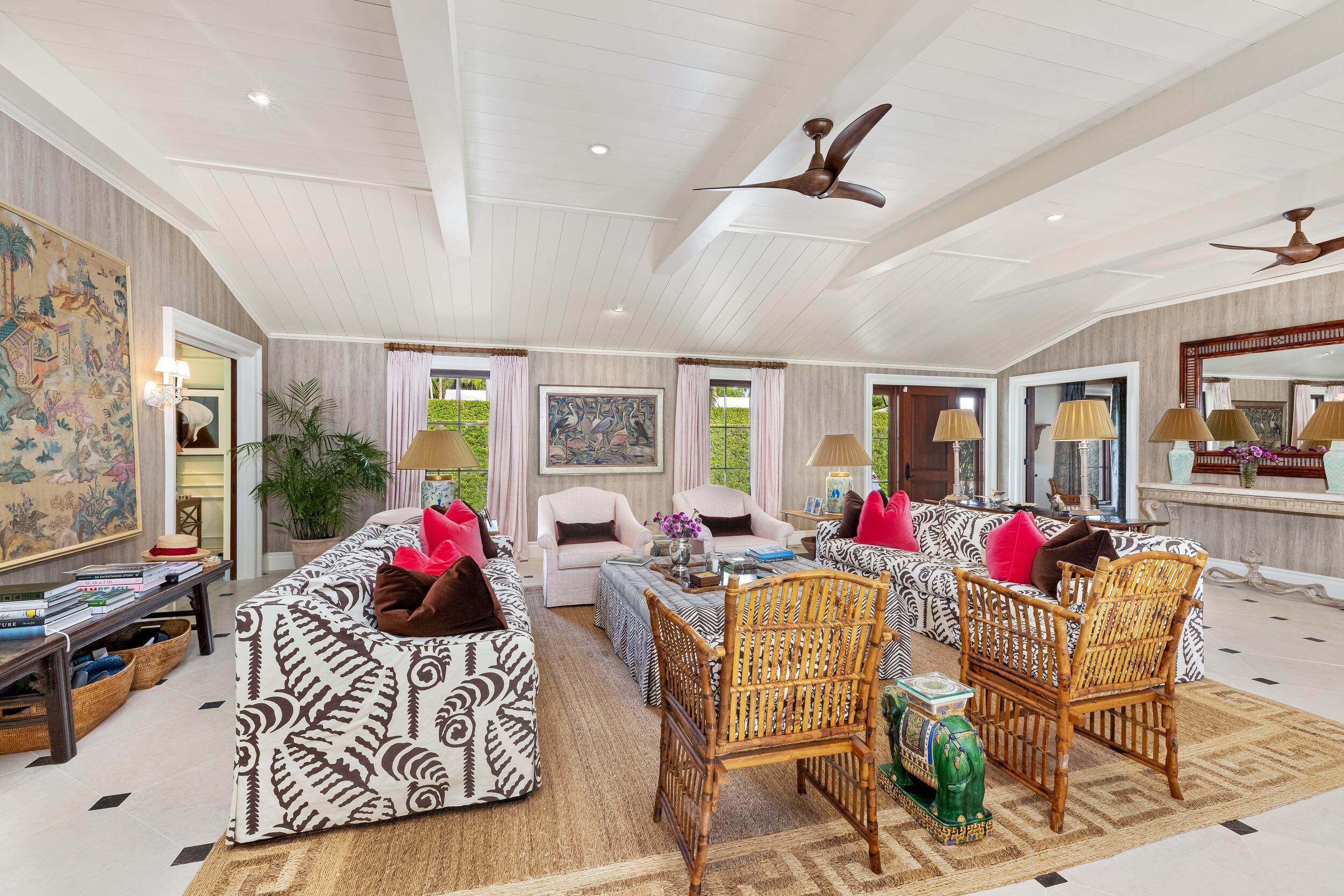 258 List Road Palm Beach, FL 33480 - Photo 9 of 49 a living room with furniture and a flat screen tv