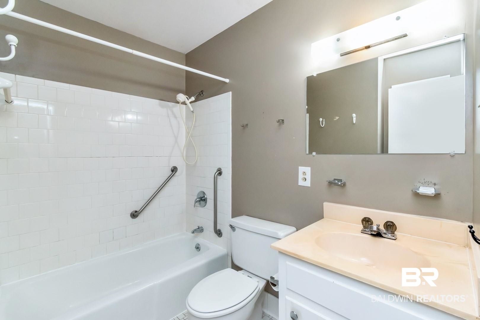 5517 Vanderbilt Drive Mobile, AL 36608 - Photo 26 of 33 Full bathroom featuring vanity, toilet, and tiled shower / bath combo