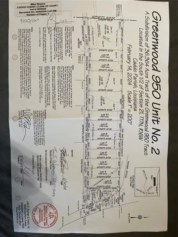 a view of a bathroom with a shower and a window