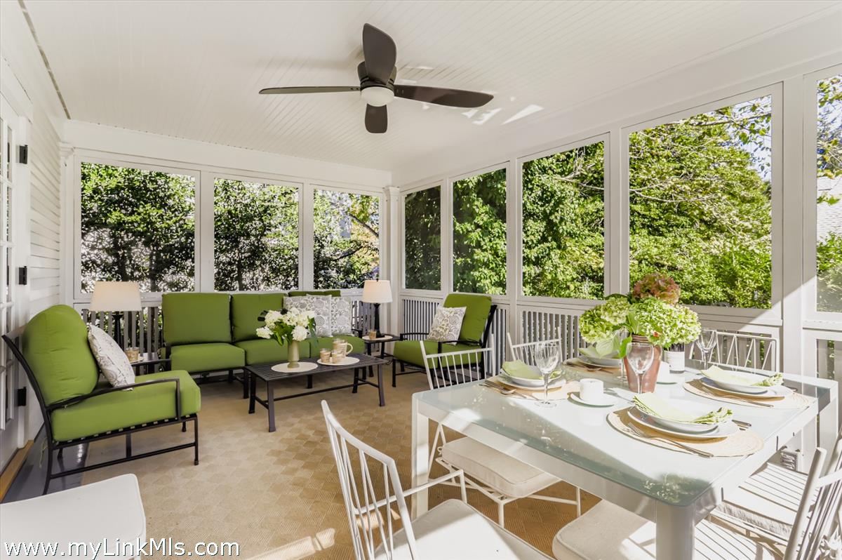27 Spring Street Vineyard Haven, MA 02568 - Photo 5 of 58 a living room with furniture and a large window