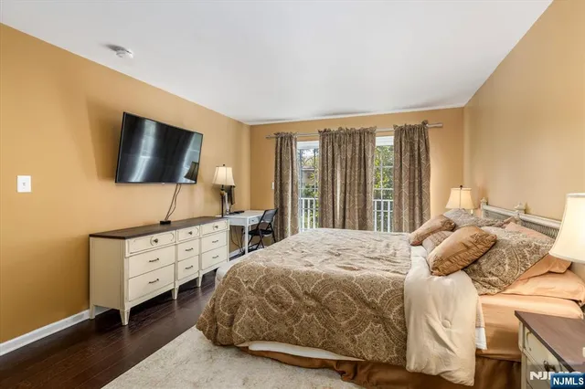 a bed room with a bed and a couch