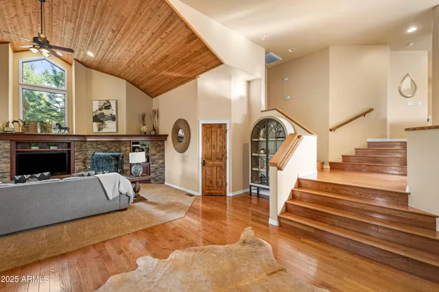 a bedroom with bed and balcony