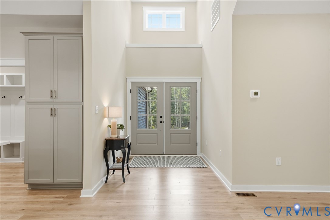 239 Bumpass Road Bumpass, VA 23024 - Photo 4 of 44 Bright entryway featuring French doors with transo