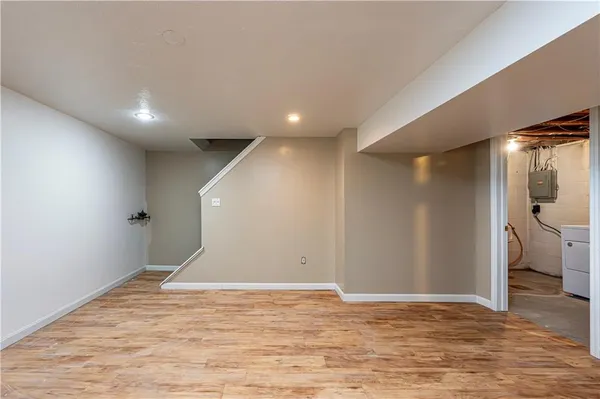 a view of a livingroom with wooden floor