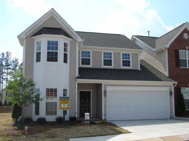12211 Fox Valley Street Raleigh, NC 27614 - Photo 1 of 1 a front view of a house with a yard