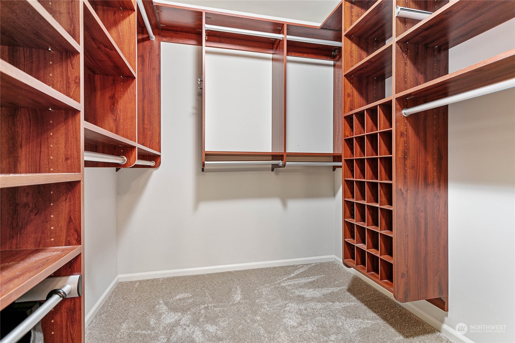 2509 201st Street Southeast Bothell, WA 98021 - Photo 15 of 33 a view of walk in closet with empty racks