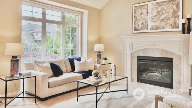 2509 201st Street Southeast Bothell, WA 98021 - Photo 4 of 33 a living room with furniture a window and a fireplace