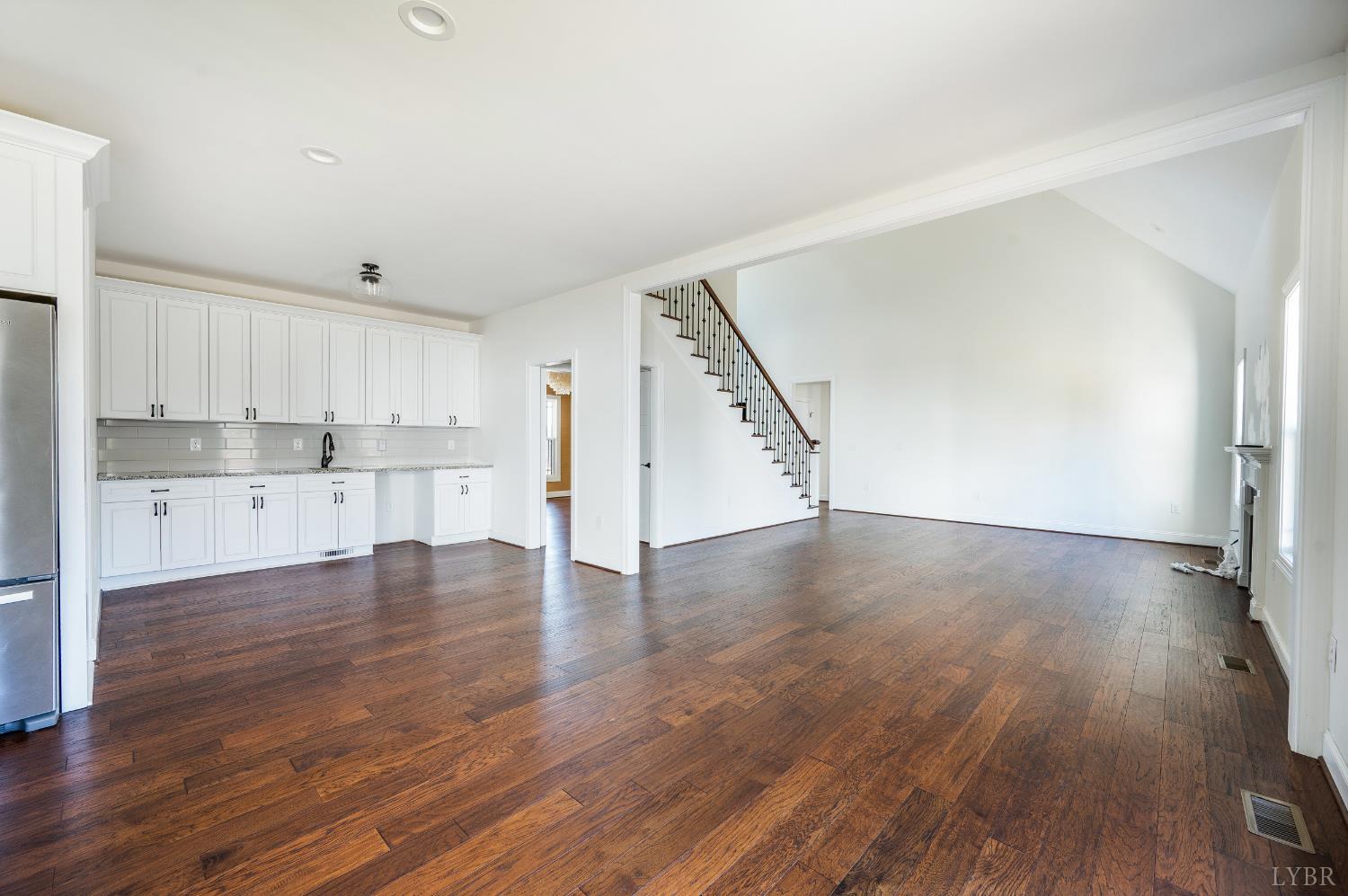 1089 Elk Creek Road Forest, VA 24551 - Photo 29 of 67 a view of a kitchen with wooden floor and electronic appliances