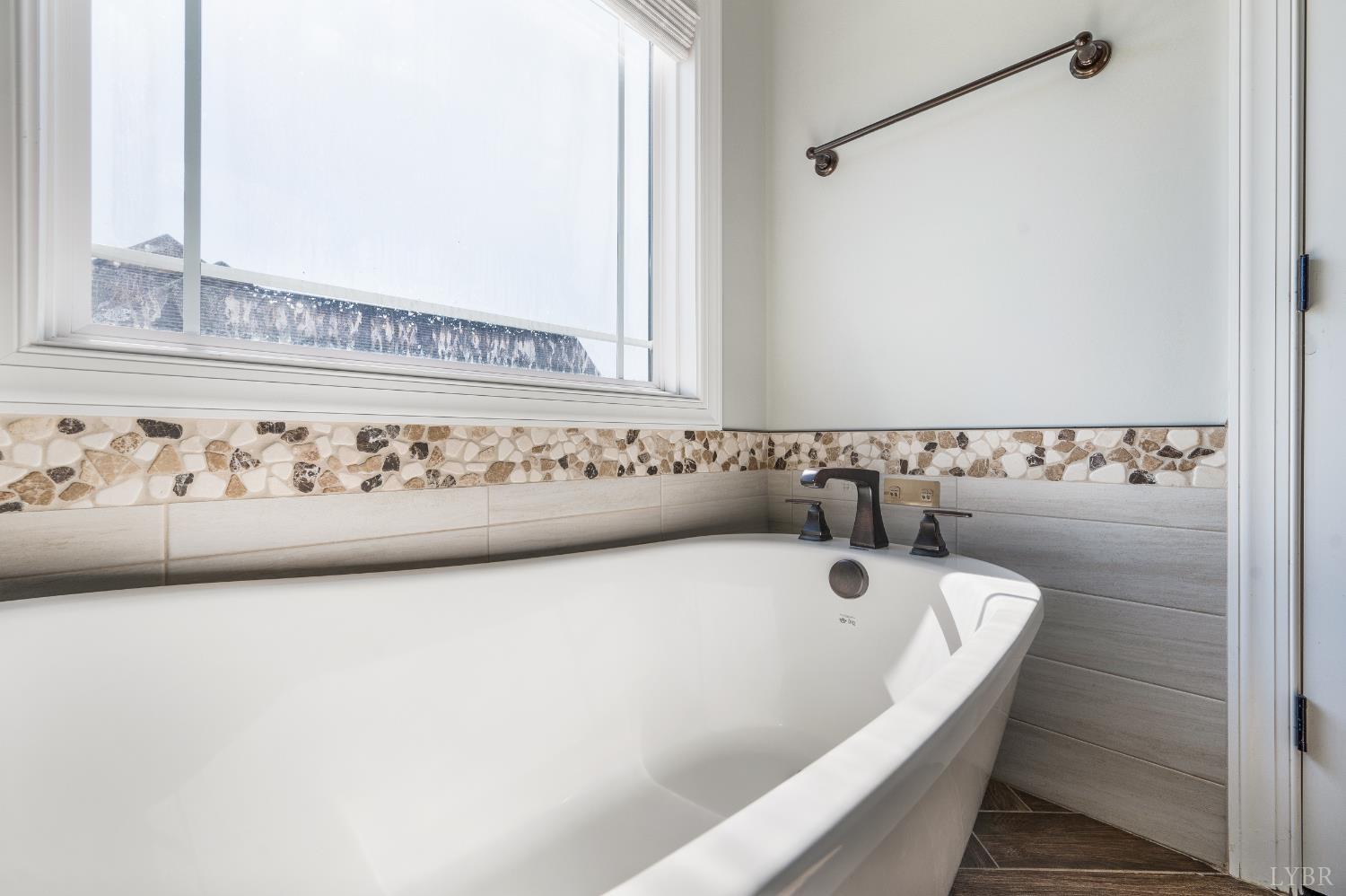 1089 Elk Creek Road Forest, VA 24551 - Photo 37 of 67 a view of a bathtub in a bathroom