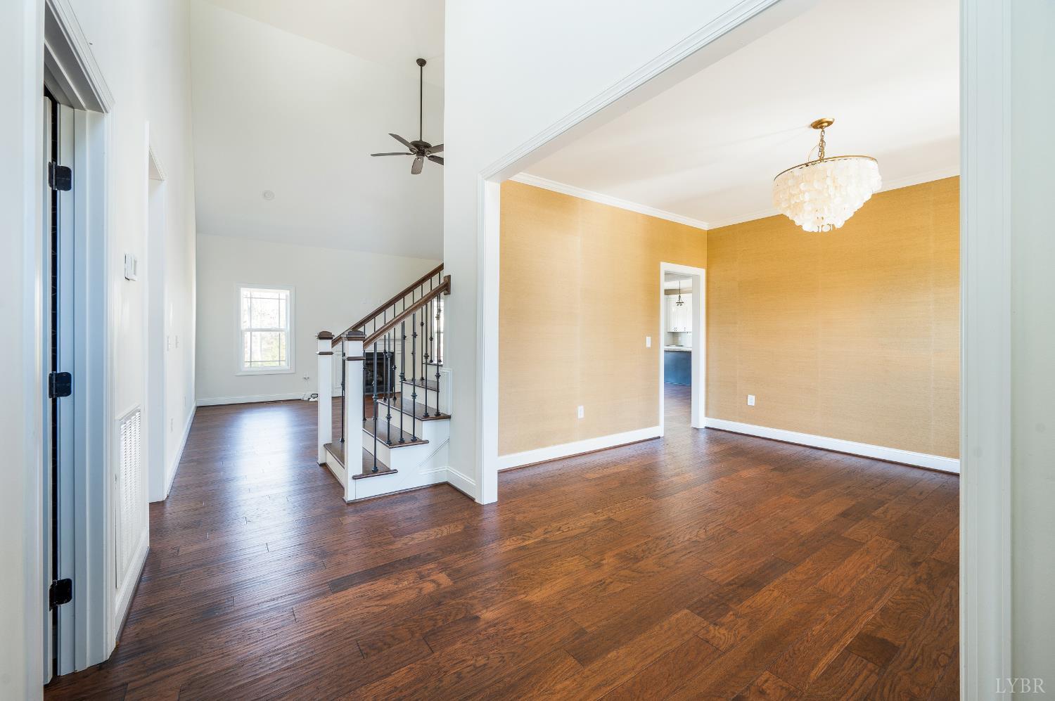 1089 Elk Creek Road Forest, VA 24551 - Photo 64 of 67 a view of a hallway with wooden floor and staircase