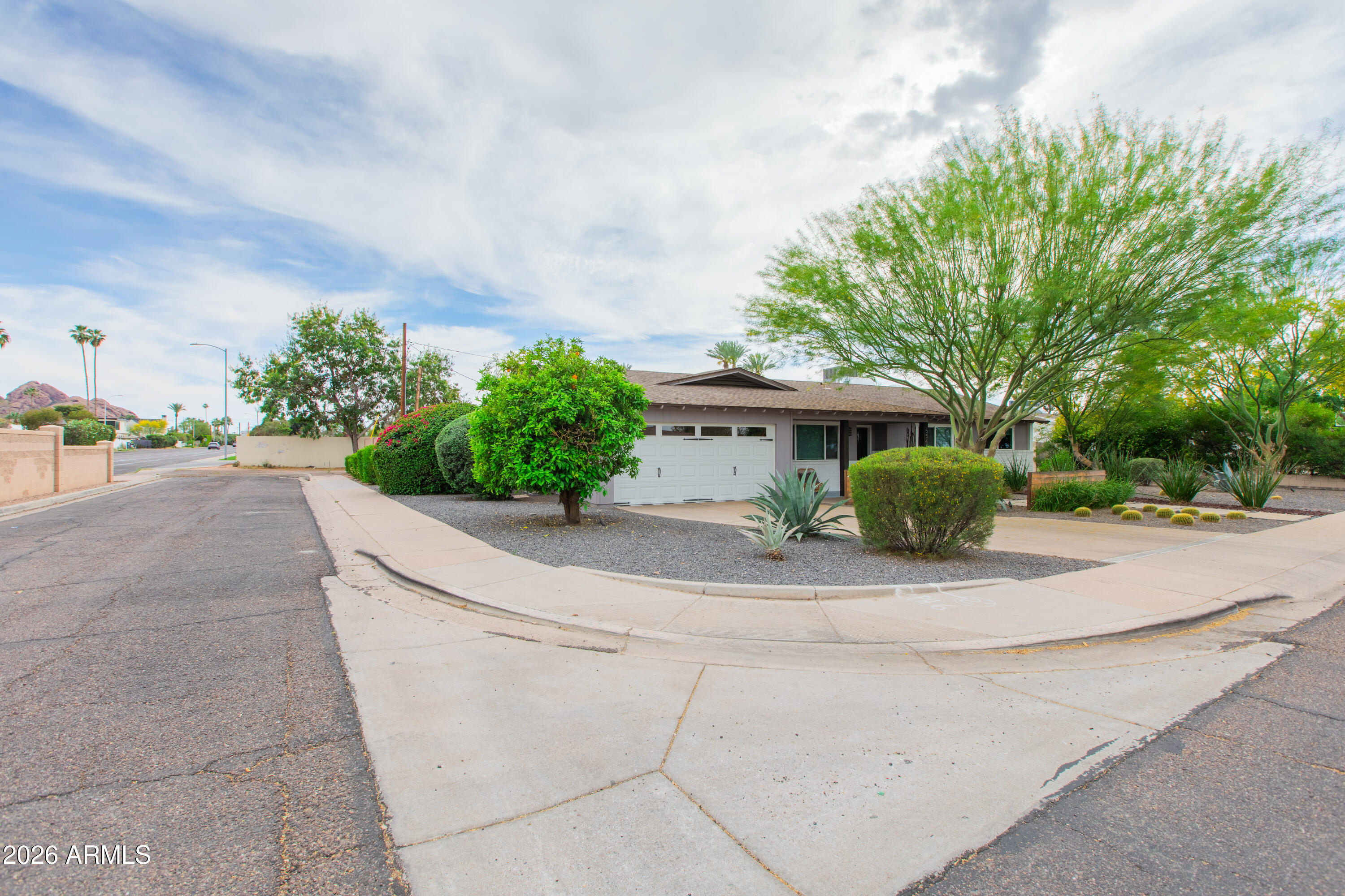 5541 East Cheery Lynn Road Phoenix, AZ 85018 - Photo 3 of 69 a view of a house with a yard and large tree