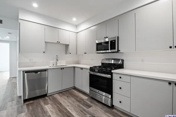 a bathroom with a sink and vanity