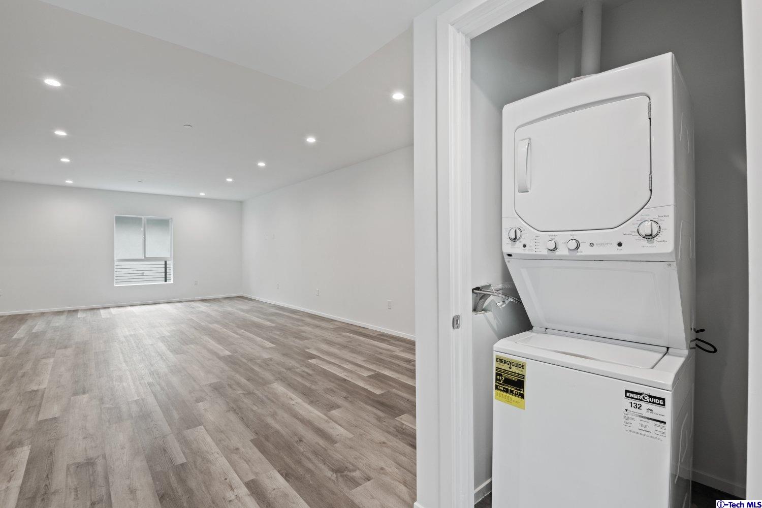 7064 Greeley Street, Unit 204 Tujunga, CA 91042 - Photo 33 of 39 a view of a storage & utility room with washer and dryer
