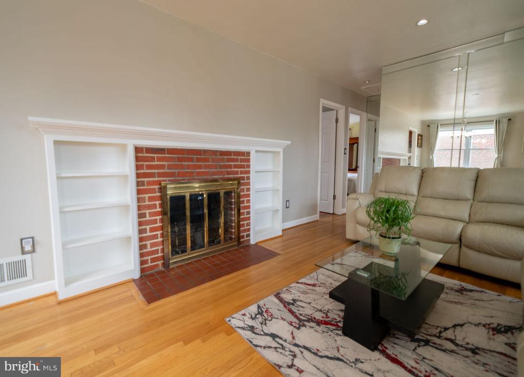 9616 Cottrell Terrace Silver Spring, MD 20903 - Photo 5 of 30 Living Room with fireplace